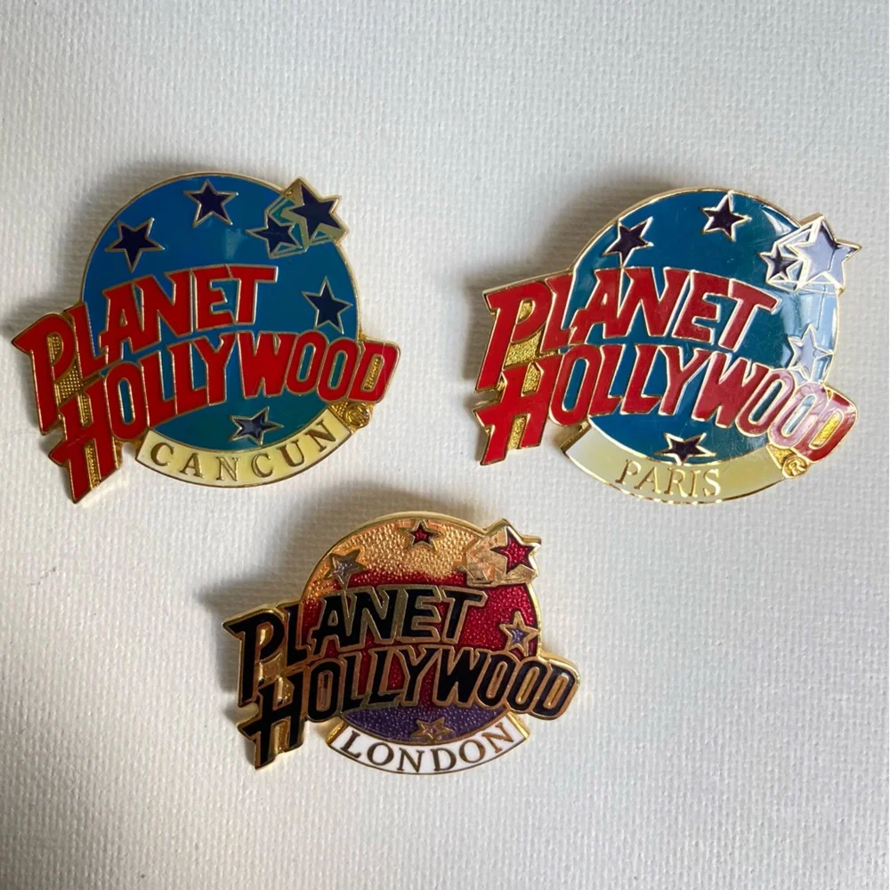 Planet Hollywood Cancun Paris London three pins in enamel over goldtone metal